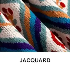 Monivärinen jacquard-neulos KnitSeekin tekniikkanäytteessä